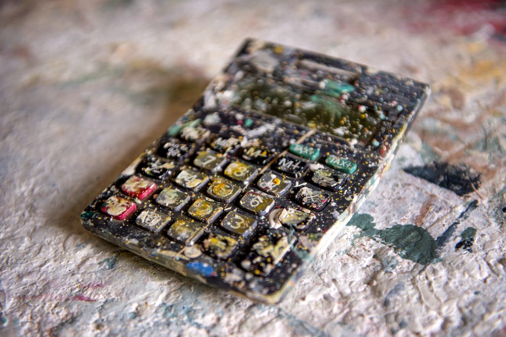 Paint splattered calculator