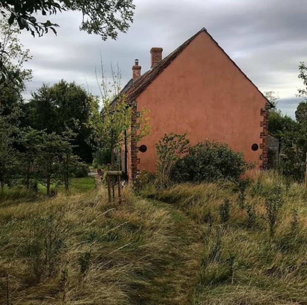 External Limewash on a Welsh Farmhouse. Painted in Clay from the Earth Collection.